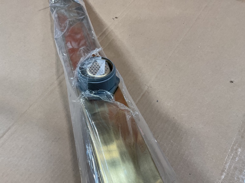 Photo 1 of ***parts missing 
Infinity Drain 24" FX Series Complete Kit with Solid Grate