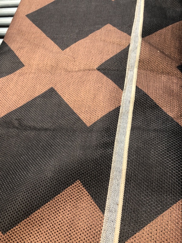 Photo 1 of (used)(minor damage)(see all images) outdoor area rug