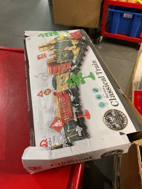 Photo 2 of  ***(PARTS ONLY/ NON FUNCTIONAL/ NO RETURNS OR REFUNDS)***
JUQU Train Set-Electric Train Sets for Boys Toddlers Classical Train Toys,Battery-Powered Locomotive Engine with Sound and Lights, 3 Cars &10 Tracks, Christmas Toy Train for Age 3 4 5 6 Years Old 