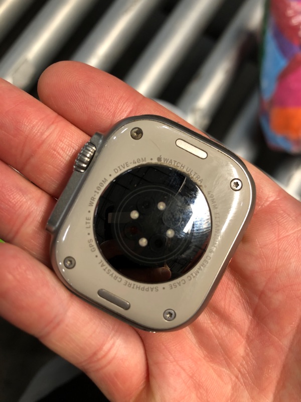 Photo 1 of (PARTIALLY FUNCTIONAL) Apple Watch Ultra 2 [GPS + Cellular 49mm] Smartwatch with Rugged Titanium Case & Blue Ocean Band One Size. Fitness Tracker, Precision GPS, Action Button, Extra-Long Battery Life
