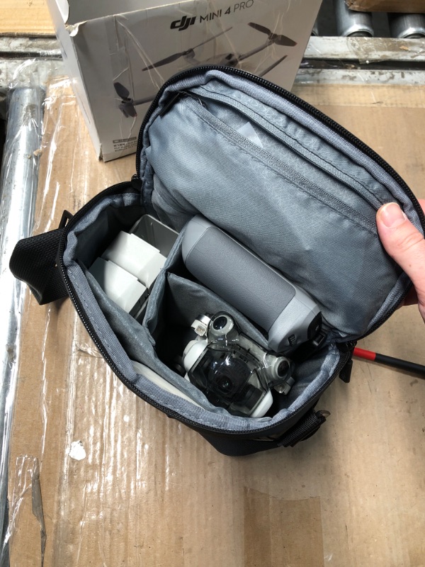 Photo 1 of (PARTIAL SET) (REMOTE POWER TESTED) DJI Mini 4 Pro Fly More Combo Plus with DJI RC 2, Drones with Camera for Adults 4K, 3 Intelligent Flight Battery Plus for up to 135 Mins Flight Time, Smart Return to Home, Drone for Beginners