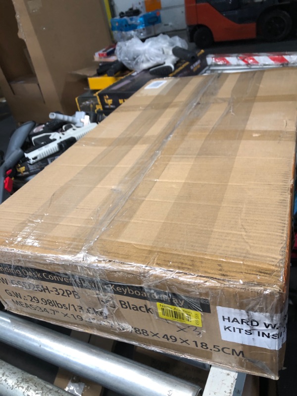 Photo 1 of **FINAL SALE/PARTS MISSING/PARTS ONLY*** JOY worker Standing Desk Converter, 32" Wide Height Adjustable Sit Stand Up Desk Riser with Keyboard Tray, Desktop Workstation Riser for Home Office Computer Laptop, Particle Board, Black