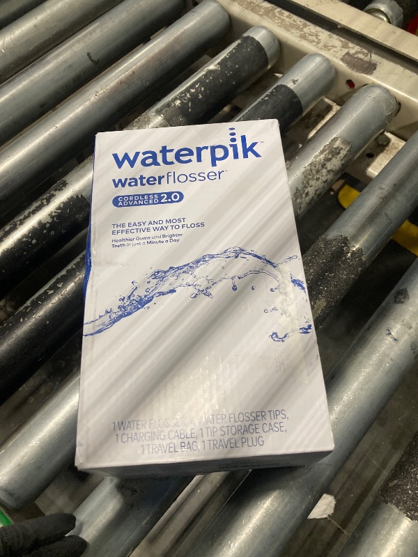 Photo 1 of Waterpik Cordless Advanced 2.0 Water Flosser For Teeth, Gums, Braces, Dental Care With Travel Bag and 4 Tips, ADA Accepted, Rechargeable, Portable, and Waterproof, White WP-580, Packaging May Vary