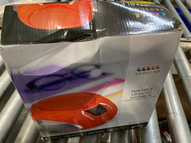 Photo 1 of PROSCAN ELITE PORTABLE CD PLAYER BOOMBOX with AM/FM Radio + Built In Speakers + Aux Input to Phone/Headphones/Any Audio - CD Players for Home Using AC Adapter or C Batteries (Orange)