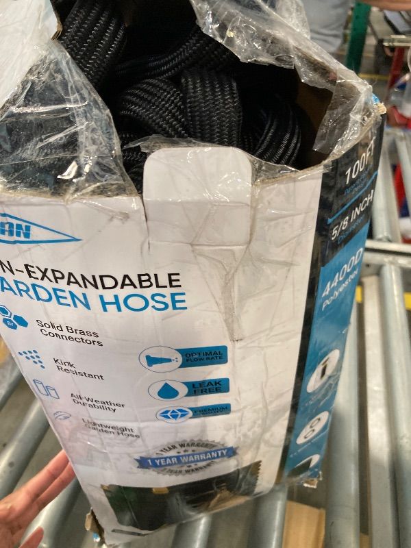 Photo 1 of ***MISSING NOZZLE***
TITAN Garden Hose | Flexible, Lightweight, Kink-Free & Durable Hybrid Water Hose with Heavy Duty Brass Connectors & High-Pressure Jet Nozzle (100FT x 5/8”)