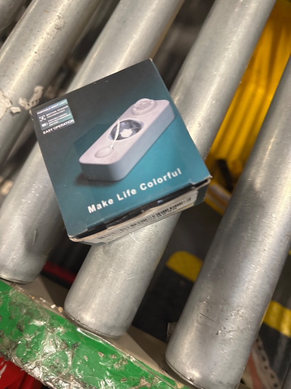 Photo 1 of NIEGNOWOO LED Motion Sensor Puck Lights, Rechargeable Cabinet Lights, Stick on Wireless LED Night Light for Closet, Drawer, Shelf, Under Cabinet, Warm White 4Pack, USB Charging Cord Included