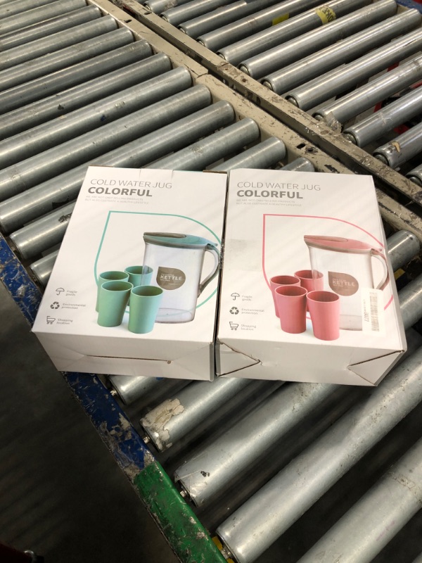 Photo 1 of Coloch 2 Pack 2 Quart Plastic Water Pitcher with Flip Top Spout Lid, Clear Slim Water Container for Fridge Door Juice Pitcher with Scale Line for Tea, Lemonade, Handmade Drinks, Blue and Pink