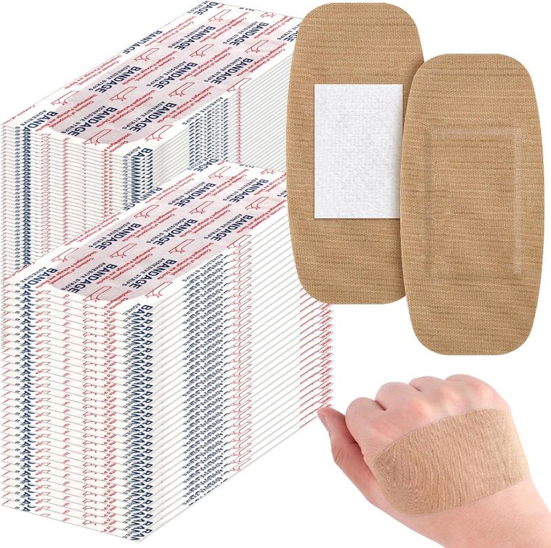 Photo 1 of Sinmoe 200 Pcs Large Bandages Bulk Big Flexible Adhesive Wound Care Fabric Bandages for Care and Protect Wounds, 2 x 4 Inch
