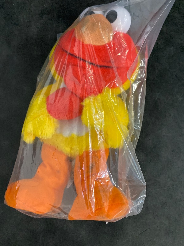 Photo 1 of Just Play Sesame Street Chicken Dance Elmo 13 Inch Feature Plush, Music and Dancing, Stuffed Animal, Kids Toys for Ages 2 Up