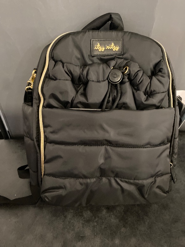 Photo 1 of Itzy Ritzy Dream Diaper Bag Backpack - Compact Baby Backpack Diaper Bag with 14 Pockets, Changing Pad, Stroller Straps, Laptop Pocket & Comfortable Straps (Midnight Black)
