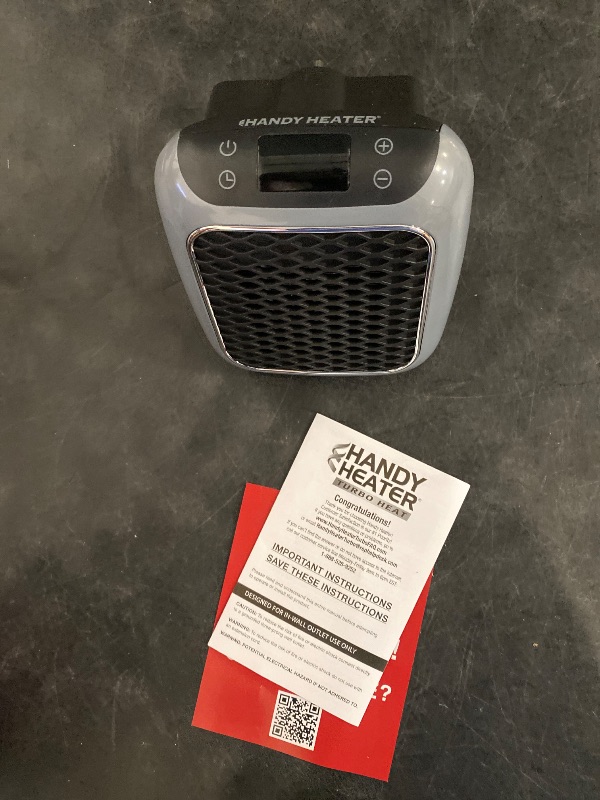 Photo 1 of Ontel Handy Heater Turbo Wall Outlet Small Space Heater with Adjustable Thermostat, Programmable 12-Hour Timer, Auto Shut Off - Quiet, Space-Saving, Ceramic (Packaging May Vary)