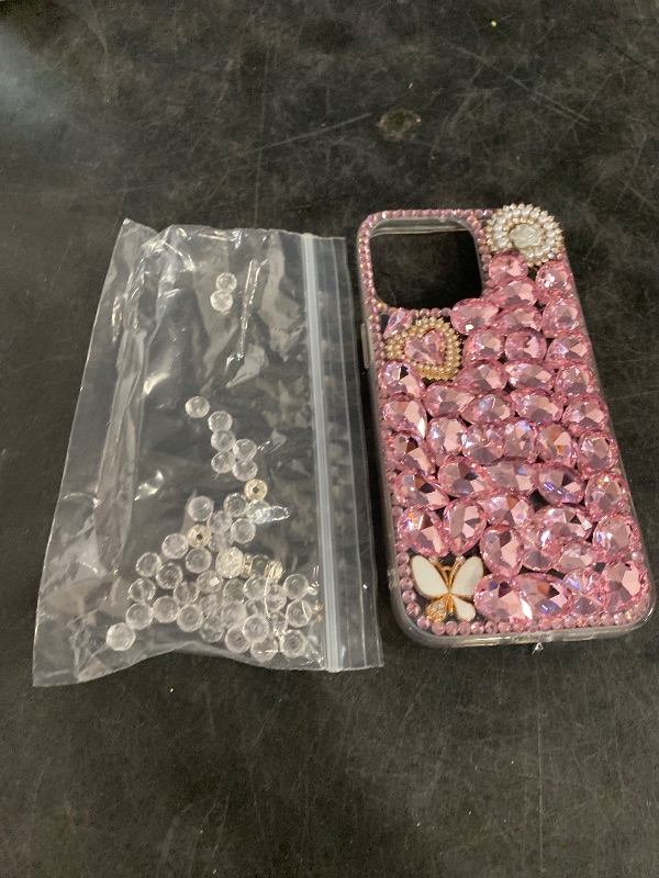Photo 1 of iPhone 15 Glitter Bling Case,Cute Luxury 3D Crown Crystal Rhinestone Diamond Sparkle Stunning Stones Pearl with Wrist Strap Chain Women Girls Protective Case for iPhone 15 6.1 inch (Pink)