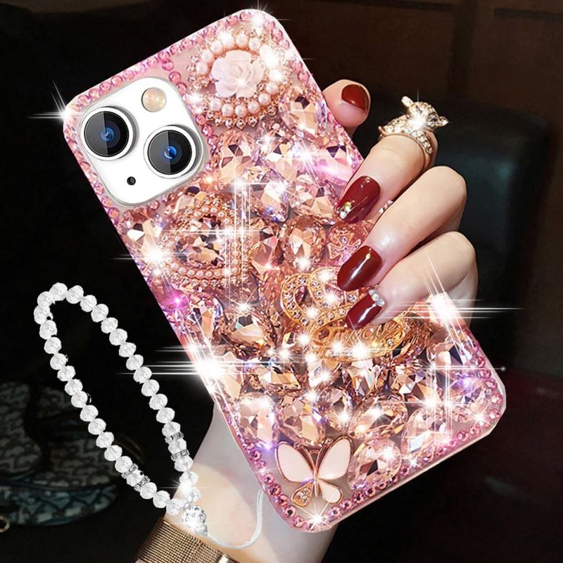 Photo 1 of iPhone 15 Glitter Bling Case,Cute Luxury 3D Crown Crystal Rhinestone Diamond Sparkle Stunning Stones Pearl with Wrist Strap Chain Women Girls Protective Case for iPhone 15 6.1 inch (Pink)