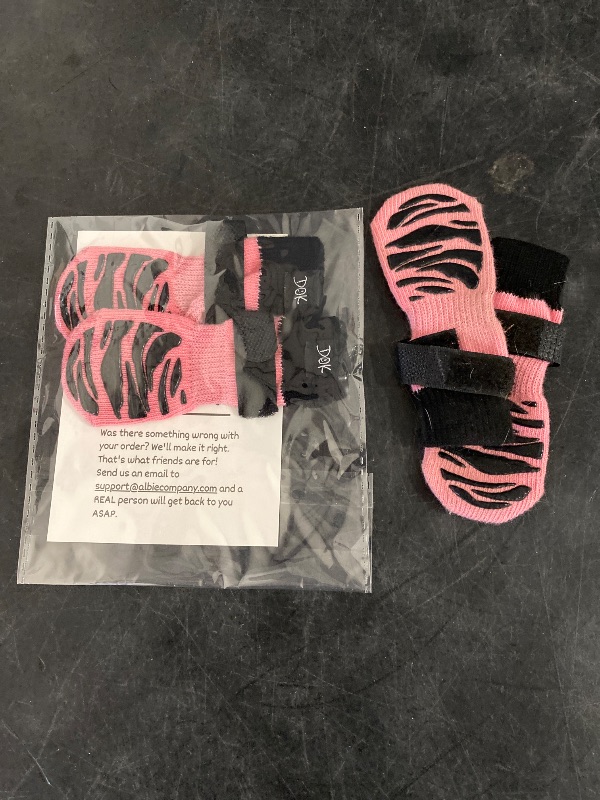 Photo 1 of DOK TigerToes Premium Non-Slip Dog Socks for Hardwood Floors - Extra-Thick Grip That Works Even When Twisted - Prevents Licking, Slipping, and Great for Dog Paw Protection (Sassy Pink, X-Small)