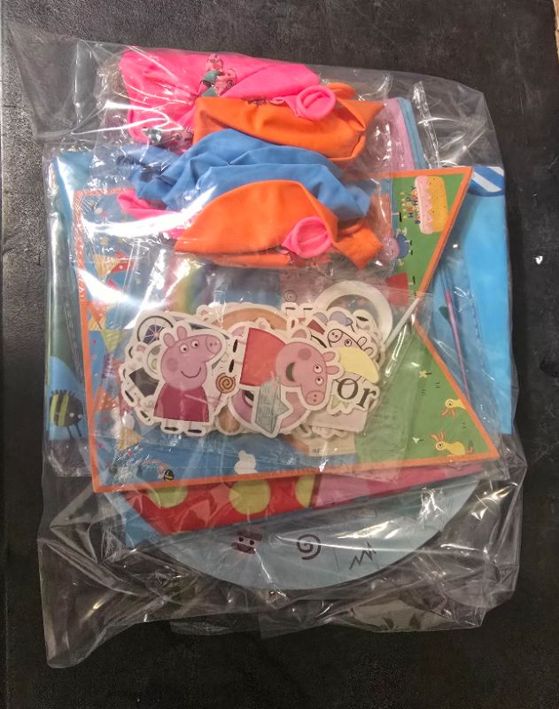 Photo 1 of Peppa Pig Party Supplies with Plates ,Banner, Table Cloth, Character Balloons, A Pack Regular Balloons, Sticker Bundle , And cake Topper