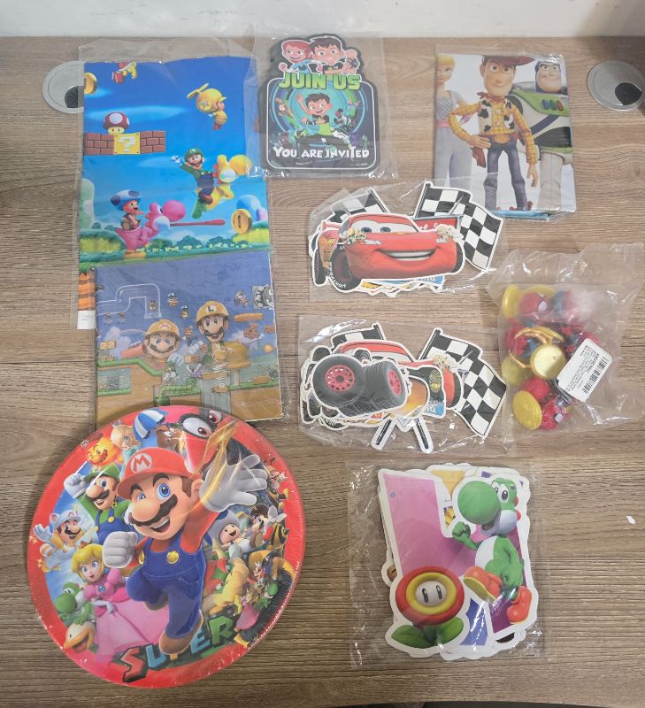 Photo 1 of Variety Boy Birthday Supplies Super Smash Plates, Banner, Table Mat , & Napkins - 2 CarsTable / Cake Decorations - Ben 10 Invite Cards - Spiderman Cake Topper Toys - Toy Story Backdrop