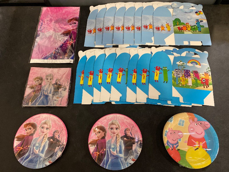 Photo 1 of Frozen + Animated Characters Party Supplies Bundle | 16 Gift Boxes, 20 Small Frozen Plates, 1 Table Cover, 20 Napkins, 10 Peppa Pig Plates