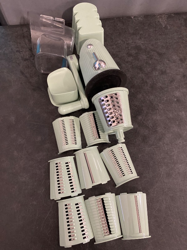 Photo 1 of Kitsy 5-in-1 Rotary Cheese Grater with Handle – Manual Cheese Shredder & Vegetable Slicer with 5 Blades, Strong Suction Base – Grater for Cheese, Veggies, Nuts (Light Green)