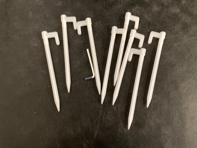Photo 1 of Plastic Tent Pegs Garden Landscape Stakes for Anchoring Garden Netting, Camping Tents, Rain Tarps and Landscape Fabric Lawn Edging