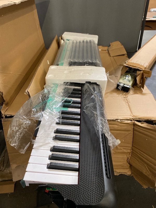 Photo 1 of 88 Key Piano Keyboard Beginner Electric Digital Piano with Full Size Semi Weighted Keys,Sustain Pedal, Power Supply, Stand, Carrying Case,Headphones