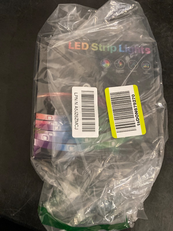 Photo 1 of LED Strip Lights Kit - RGBW Waterproof 16.4ft (5M) with 300 SMD 5050 LEDs, Warm White & Multi-Color, includes 40-Key Remote and 5A Power Supply, Cuttable & Linkable