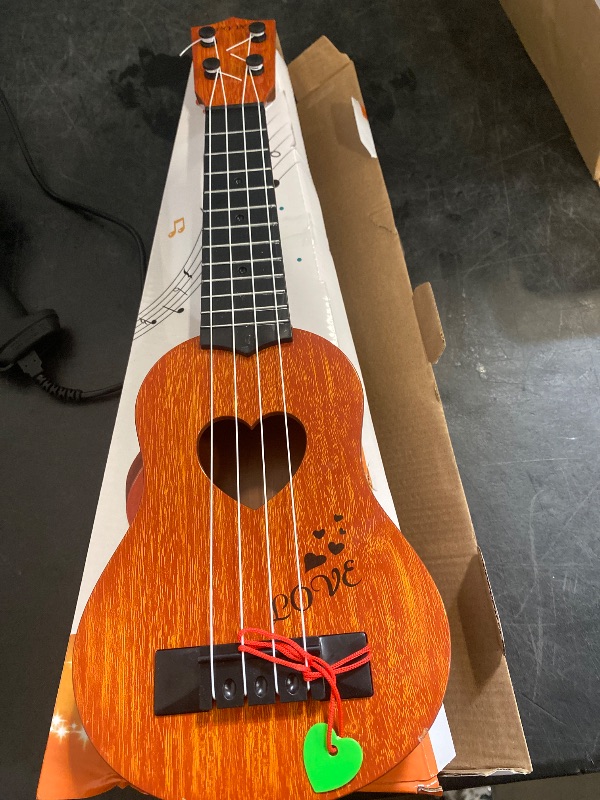 Photo 1 of YEZI Kids Toy Classical Ukulele Guitar Musical Instrument, Brown