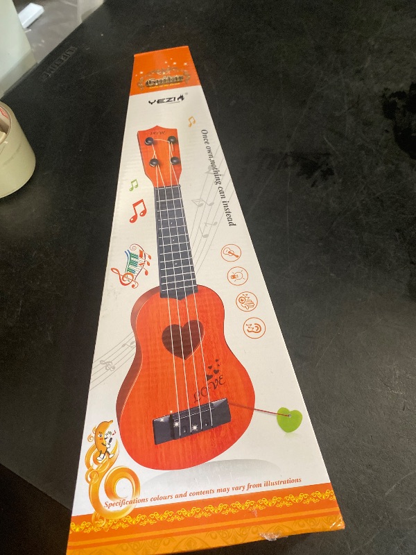 Photo 1 of YEZI Kids Toy Classical Ukulele Guitar Musical Instrument, Brown