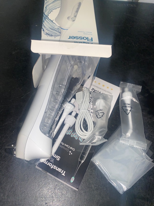 Photo 1 of AquaSonic Water Flosser - Cordless Rechargeable Water Flossers for Teeth Cleaning - Waterproof Aqua Flosser, Portable Oral Irrigator for Dental Cleaning with 5 Jet Tips – Braces Home Travel