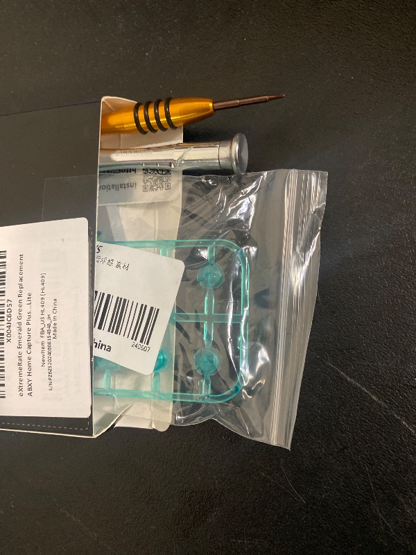 Photo 1 of eXtremeRate Emerald Green Replacement ABXY Home Capture Plus Minus Keys Dpad L R ZL ZR Trigger for Nintendo Switch Lite, Full Set Buttons Repair Kits with Tools for Nintendo Switch Lite