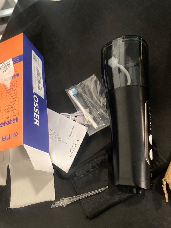 Photo 1 of Portable Cordless Water Flosser, Rechargeable Water Dental Flosser with 1500 mAh Battery, IPX7 Waterproof, 4 Modes 4 Jet Tips, Type-C Charging for Travel & Home (Black)
