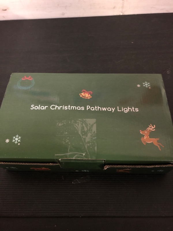 Photo 1 of Solar Christmas Pathway Lights, Star Pathway Lights Solar Powered Christmas Decorations Outdoor, Waterproof Christmas Garden Stake Lights for Patio, Yard, Garden, Lawn Decor, 4 Pack(Multicolor)