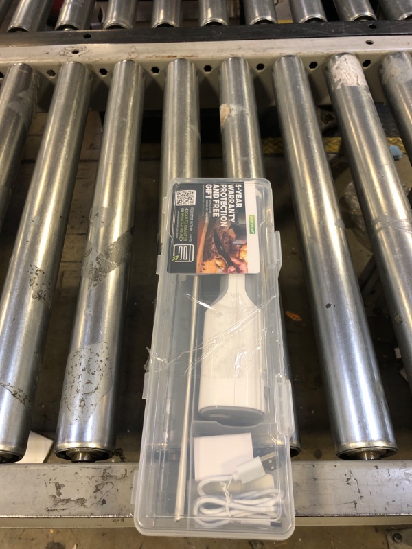 Photo 1 of NutriChef Cordless Electric Knife | Easy to Use Constant ON/OFF Safety Function Button | Carve Turkey, Meats, Poultry, Bread, Cheese & More | Lightweight with Contoured Grip Handle | White & Grey