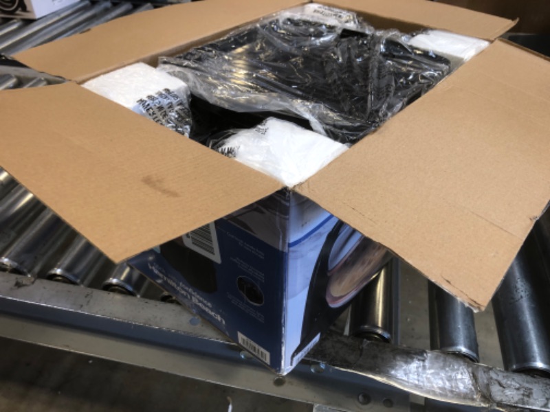 Photo 1 of Hamilton Beach 26031 Belgian Waffle Maker with Removable Nonstick Plates, Single Flip, Ceramic Grids, Black