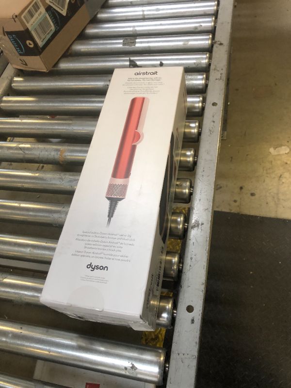 Photo 2 of Dyson Special edition Airstrait™ straightener in Strawberry bronze and blush pink