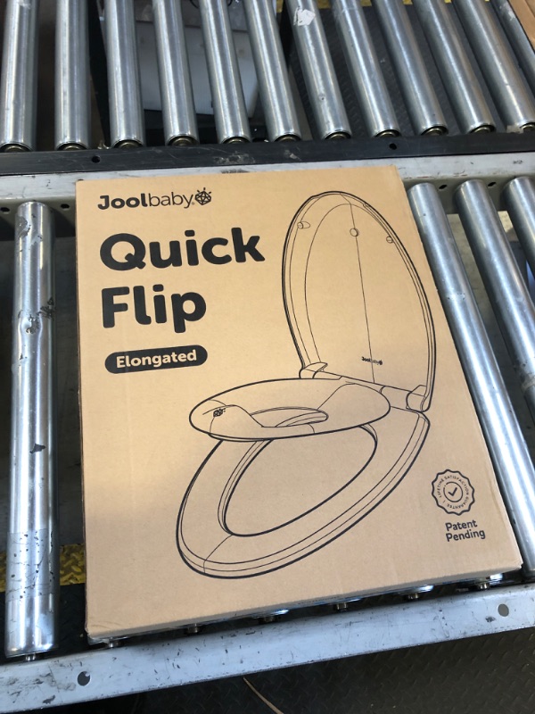 Photo 1 of Quick Flip Elongated Toilet Seat with Built-In Potty & Splash Guard for Toddler Training, Slow Close - Jool Baby