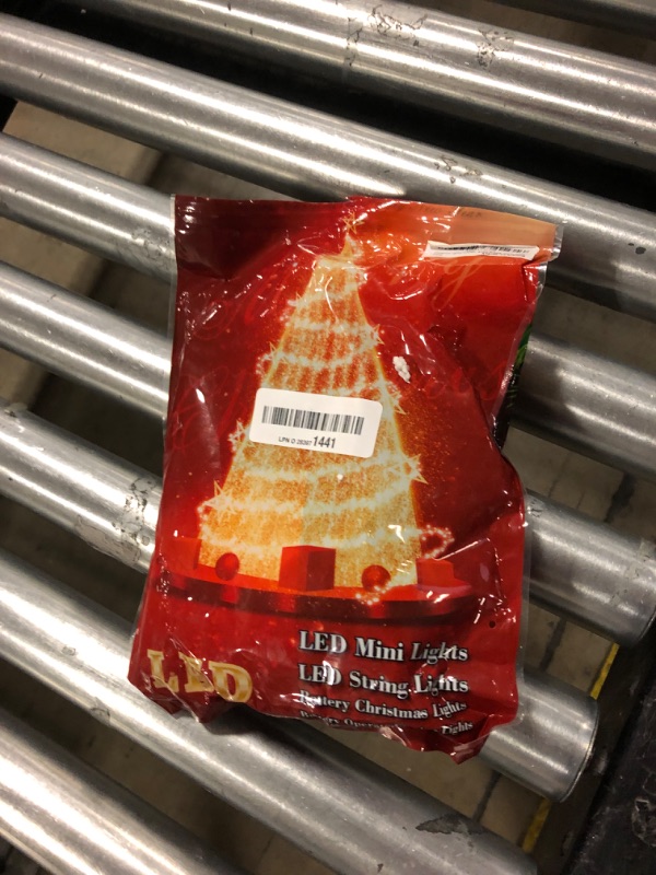 Photo 1 of LOENDE Christmas Lights with Timer Battery Operated String Lights 100 LED 8 Modes String Lights Clear Mini Light Set for Wedding Party Home Garden Wreath, Waterproof, Warm White