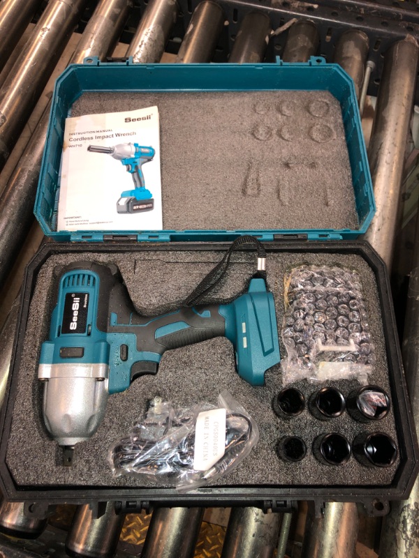 Photo 2 of Seesii Cordless Impact Wrench, 900N.m(665ft-lbs) Power Impact Gun 1/2 Inch, 4.0Ah Battery, 3300RPM Impact Wrench, 6 Sockets, Electric Impact Driver for Home Car Truck Mower Father Dad Husband