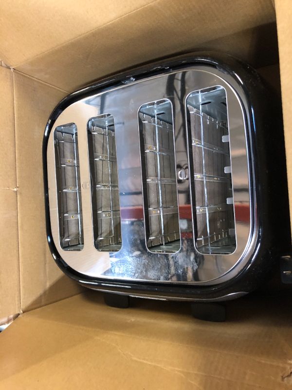 Photo 1 of BLACK+DECKER 4-Slice Toaster, Extra Wide Slots, 7 Shade Settings, 1400 Watts, Frozen and Bagel Buttons, Toast Shade Selector, Extra Lift
