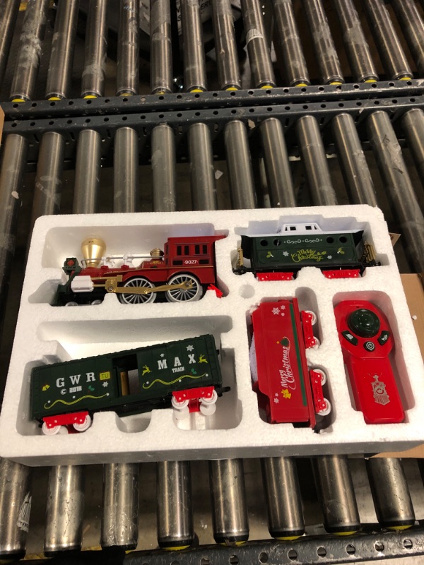 Photo 1 of Hot Bee Christmas Train Set with Remote Control Train Toys w/Smoke, Lights & Sound, Christmas Train Sets for Around The Tree, Toy Train for Toddlers Train Set for 3 4 5 6 7+ Years Old Boys Gifts