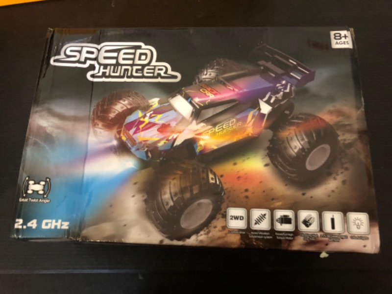 Photo 1 of AONEPTR Remote Control Car, All Terrain Remote Control Truck for Boy, 2.4GHz Rc Car with Bodylight and Two Rechargeable Batteries, 20KM/H Monster Truck Toys