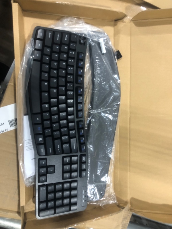 Photo 2 of Amazon Basics Ergonomic Wireless Combo Full-Sized Keyboard with Palm Rest and Comfortable Right-Handed Mouse, 2.4 GHz Wireless USB Receiver, Compatible with PC, Laptop, Black