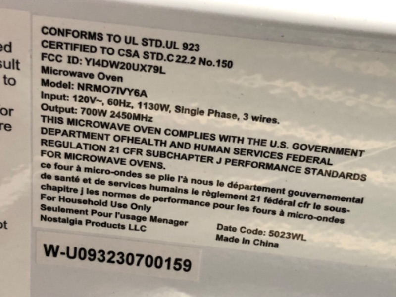 Photo 5 of ***NONREFUNDABLE - THIS SALE FINAL -  PARTS ONLY - SEE COMMENTS***
Nostalgia Retro Compact Countertop Microwave Oven - 0.7 Cu. Ft. - 700-Watts with LED Digital Display - Child Lock - Easy Clean Interior - Cream