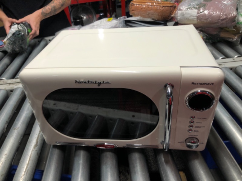 Photo 3 of ***NONREFUNDABLE - THIS SALE FINAL -  PARTS ONLY - SEE COMMENTS***
Nostalgia Retro Compact Countertop Microwave Oven - 0.7 Cu. Ft. - 700-Watts with LED Digital Display - Child Lock - Easy Clean Interior - Cream