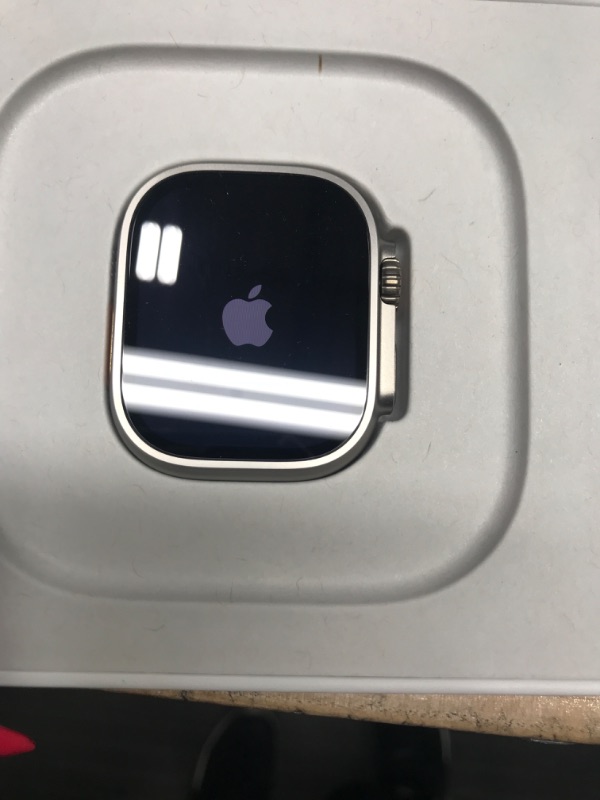 Photo 3 of ***ITEM TESTED FOR POWER, UNABLE TO TEST FURTHER***Apple Watch Ultra 2 [GPS + Cellular 49mm] Smartwatch with Rugged Titanium Case & Blue/Black Trail Loop M/L. Fitness Tracker, Precision GPS, Action Button, Extra-Long Battery Life, Carbon Neutral