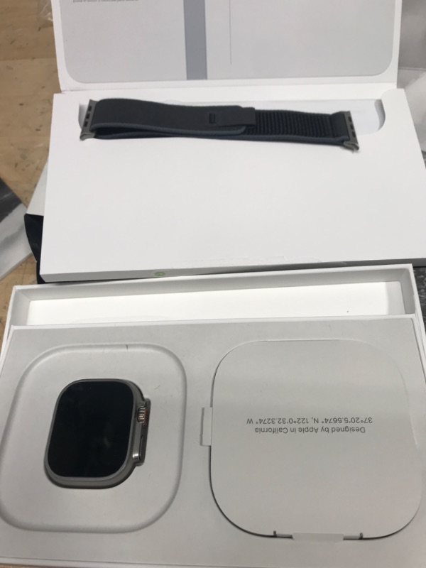 Photo 2 of Apple Watch Ultra 2 [GPS + Cellular 49mm] Smartwatch with Rugged Titanium Case & Blue/Black Trail Loop M/L. Fitness Tracker, Precision GPS, Action Button, Extra-Long Battery Life, Carbon Neutral