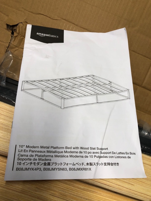 Photo 4 of ***USED - MISSING PARTS - UNABLE TO VERIFY FUNCTIONALITY - SEE PICTURES***
Amazon Basics Metal Platform Bed Frame with Wood Slat Support, Queen, Black, 79.5 x 59.5 x 10 inches (LxWxH)