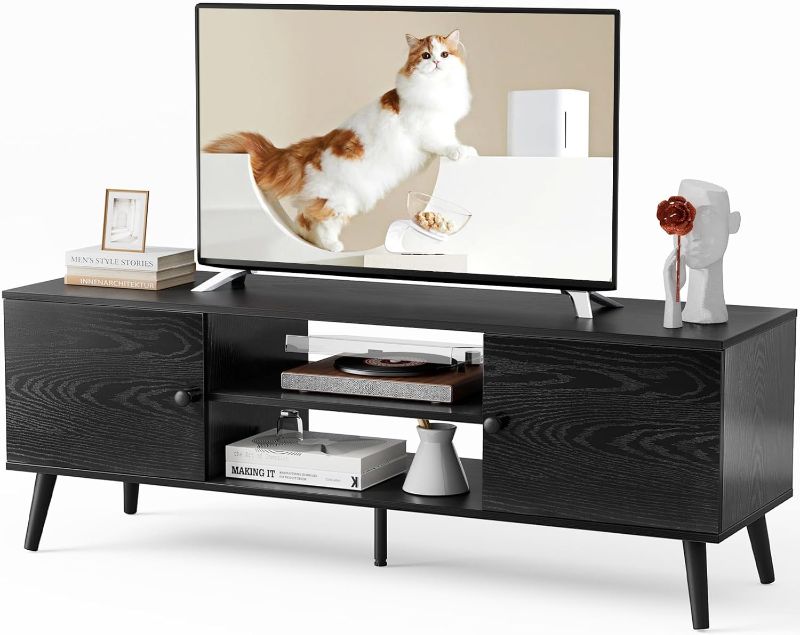 Photo 1 of 
DUMOS TV Stand for TV, Entertainment Center with Storage Cabinet, Mid Century Modern Media Console Table, Adjustable Hinge, Wooden Television...
Color:Ink Black