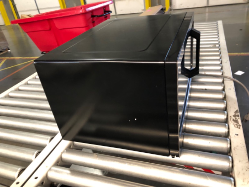Photo 1 of ***DAMAGED - DENTED - POWERS ON - UNABLE TO TEST FURTHER - SEE PICTURES***
TOSHIBA ML-EM45P(BS) Countertop Microwave Oven with Smart Sensor and Position Memory Turntable