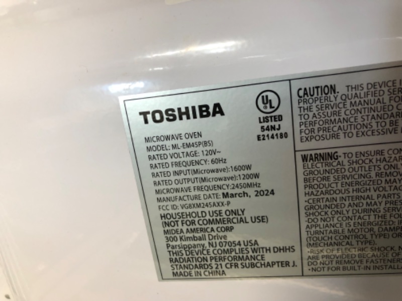 Photo 3 of ***DAMAGED - DENTED - POWERS ON - UNABLE TO TEST FURTHER - SEE PICTURES***
TOSHIBA ML-EM45P(BS) Countertop Microwave Oven with Smart Sensor and Position Memory Turntable