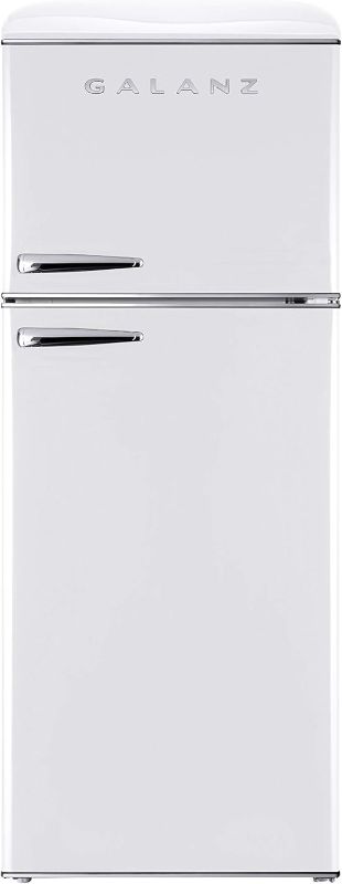 Photo 1 of **see notes - fridge is not functional**
Galanz GLR12TRDEFR Refrigerator, Dual Door Fridge, Adjustable Electrical Thermostat Control with Top Mount Freezer Compartment, Retro Red, 12.0 Cu Ft